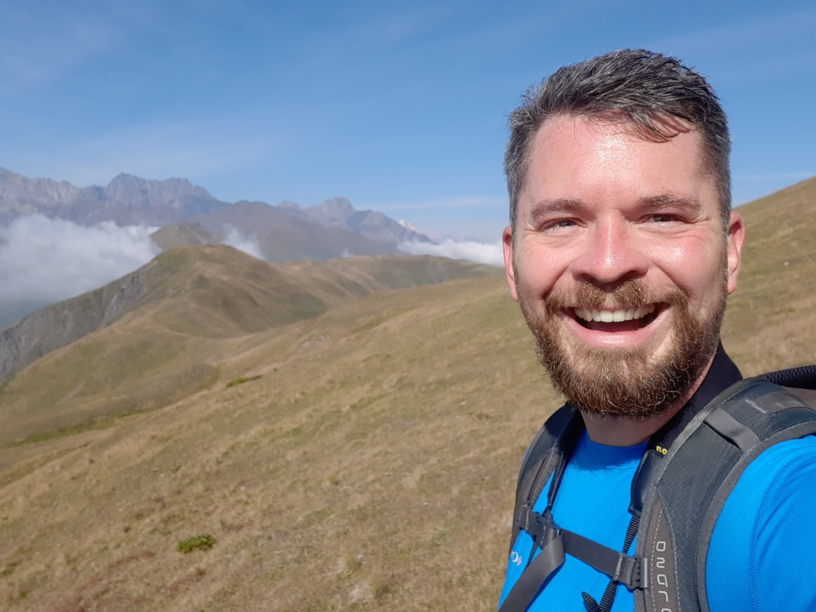 Selfie by Hans Fridlund on a mountain ridge.